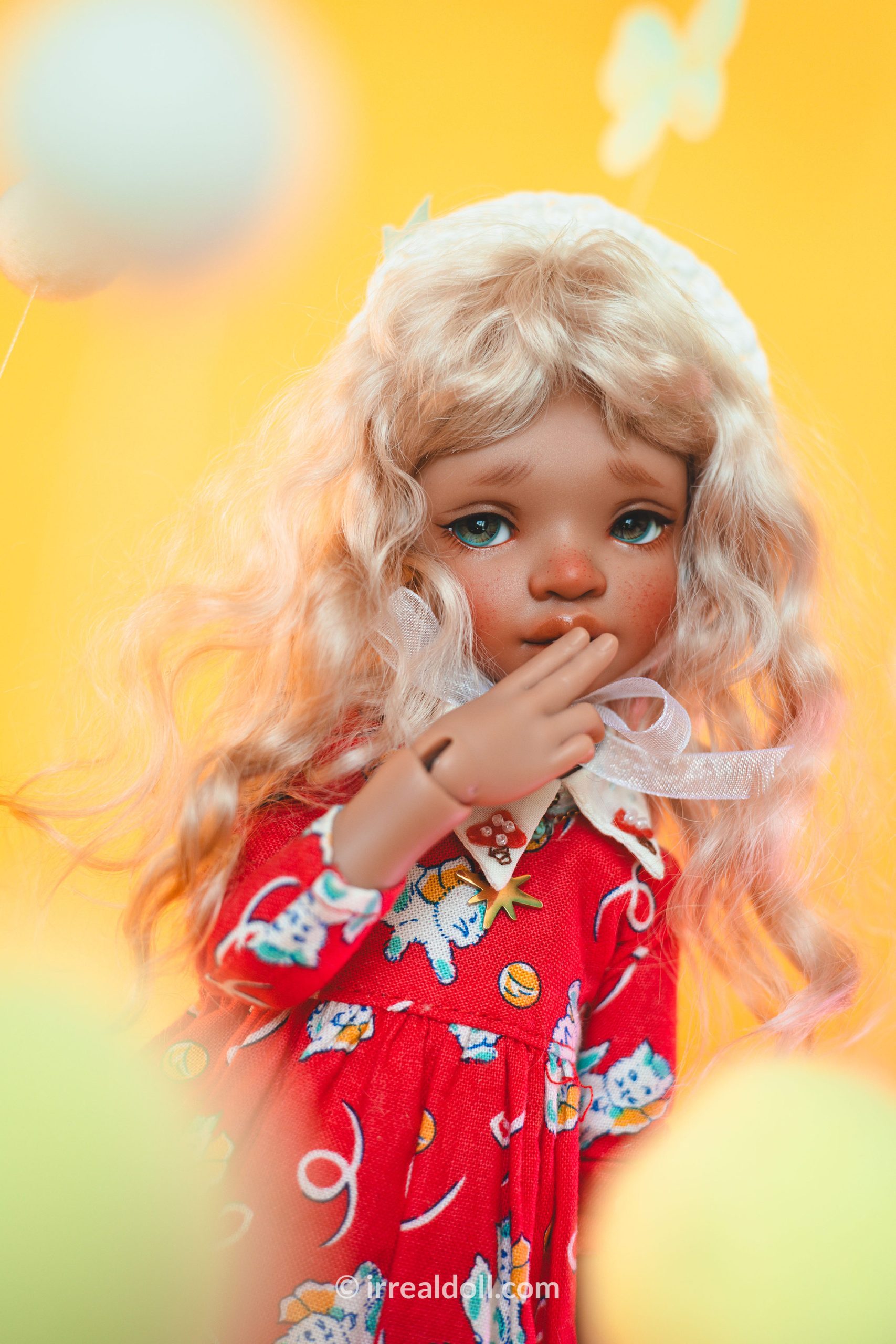 A picture of Surya, a 27cm tall doll from Irrealdoll in a dark skin tone.