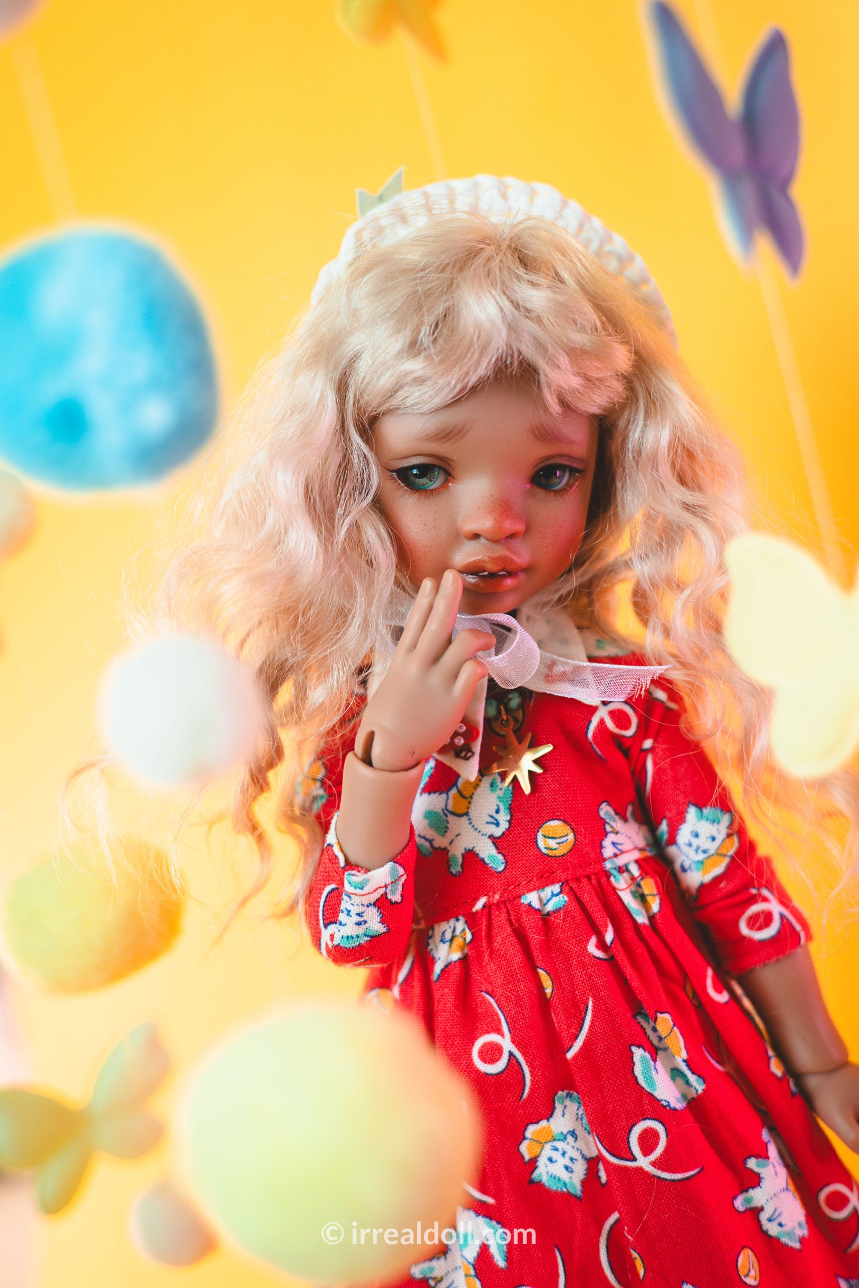 A picture of Surya, a 27cm tall doll from Irrealdoll in a dark skin tone.