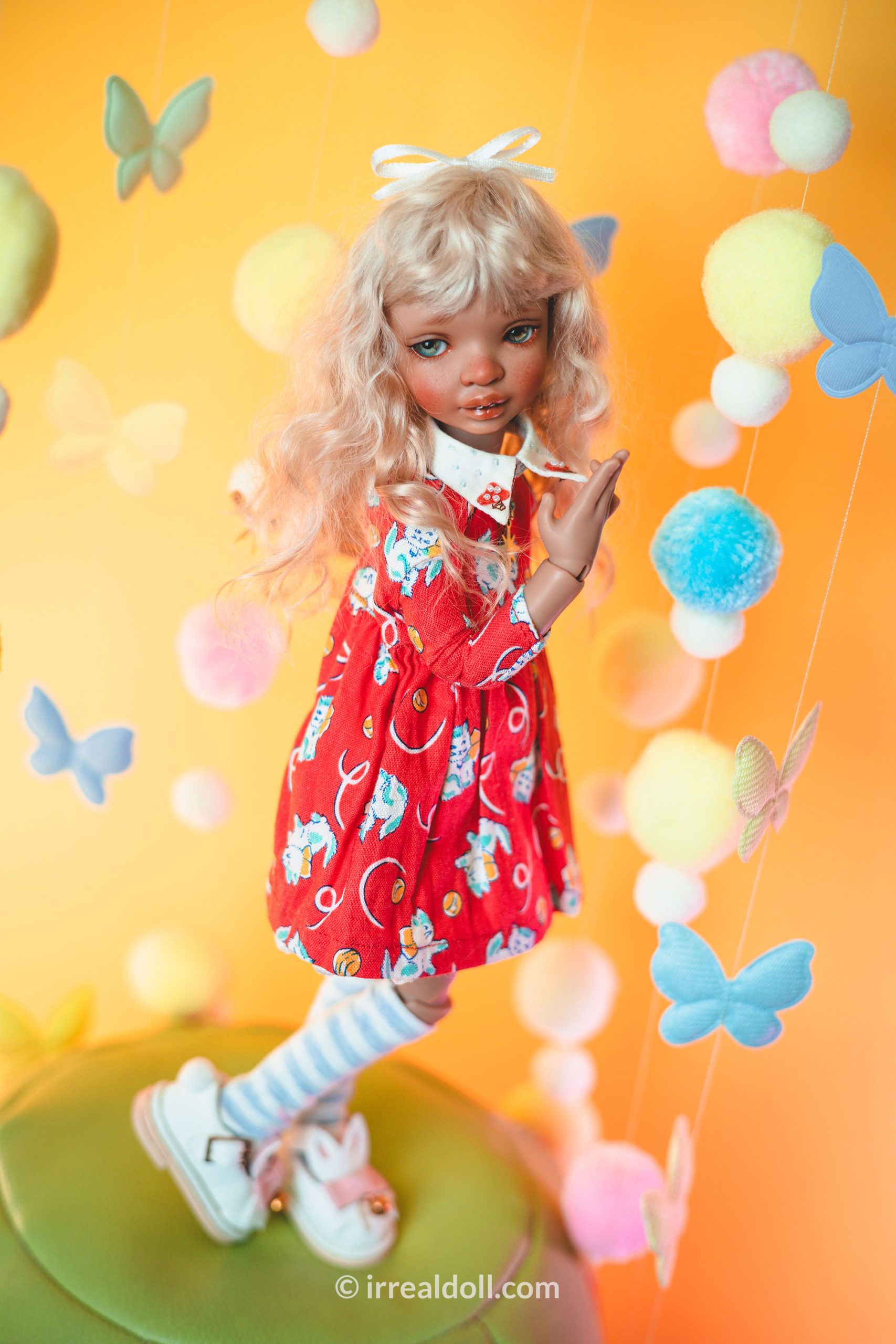 A picture of Surya, a 27cm tall doll from Irrealdoll in a dark skin tone.