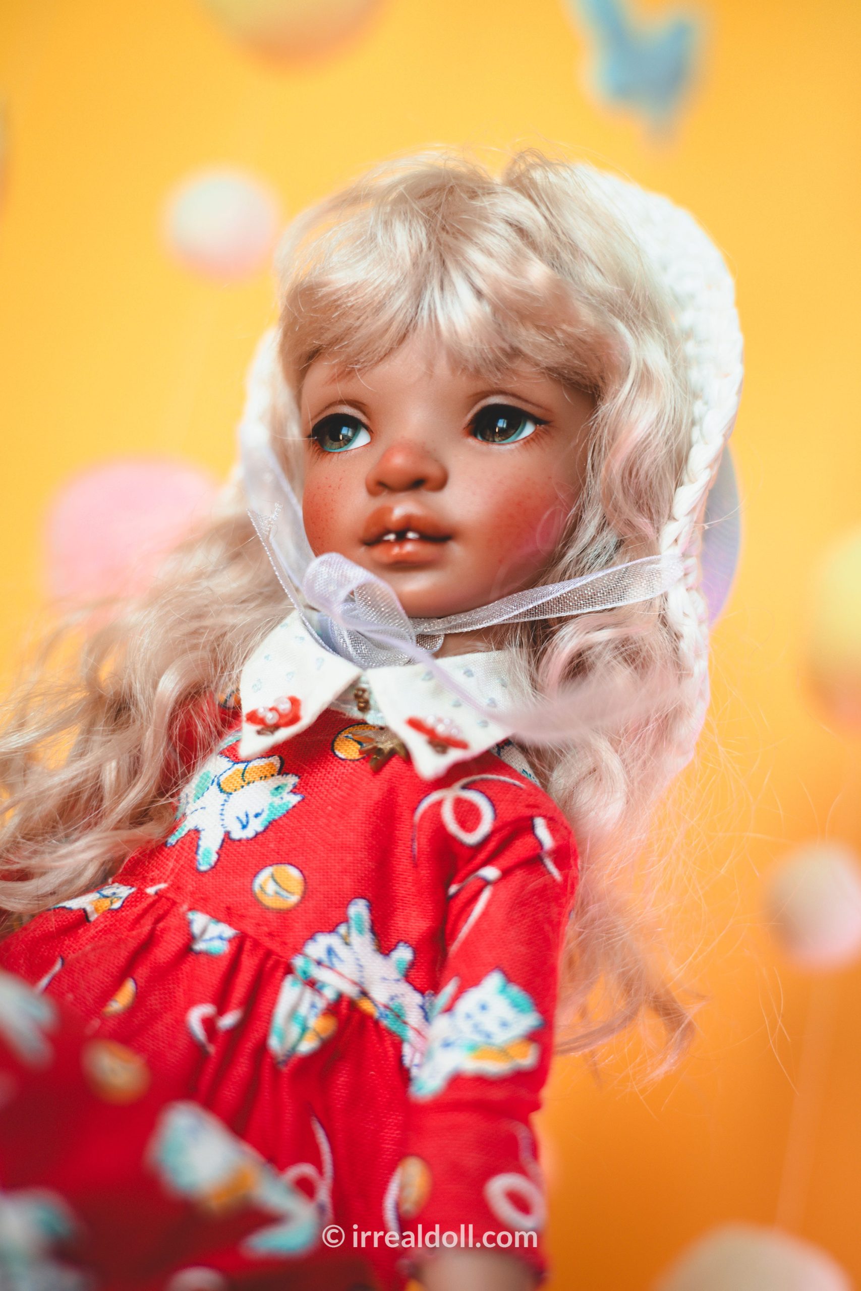 A picture of Surya, a 27cm tall doll from Irrealdoll in a dark skin tone.