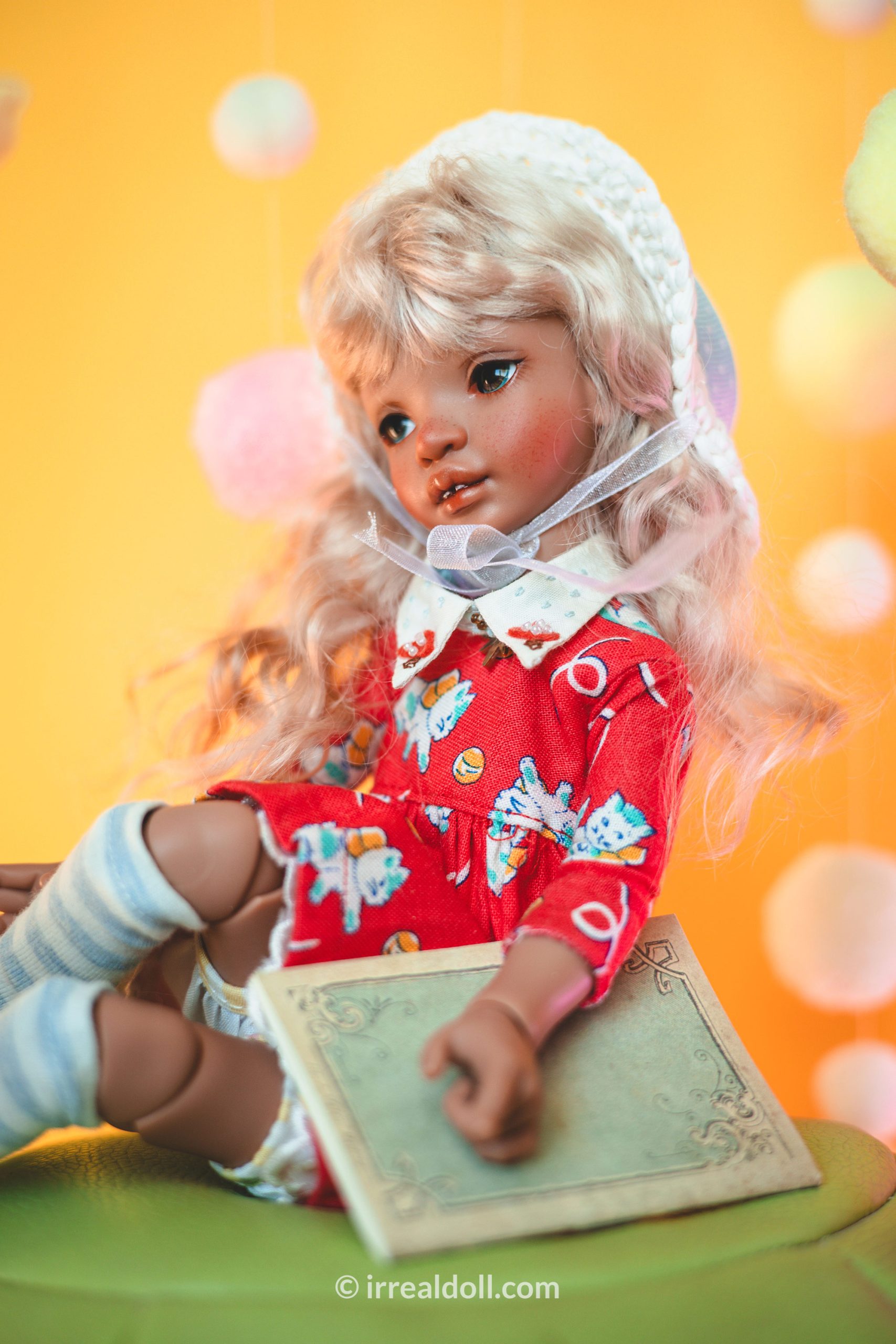 A picture of Surya, a 27cm tall doll from Irrealdoll in a dark skin tone.
