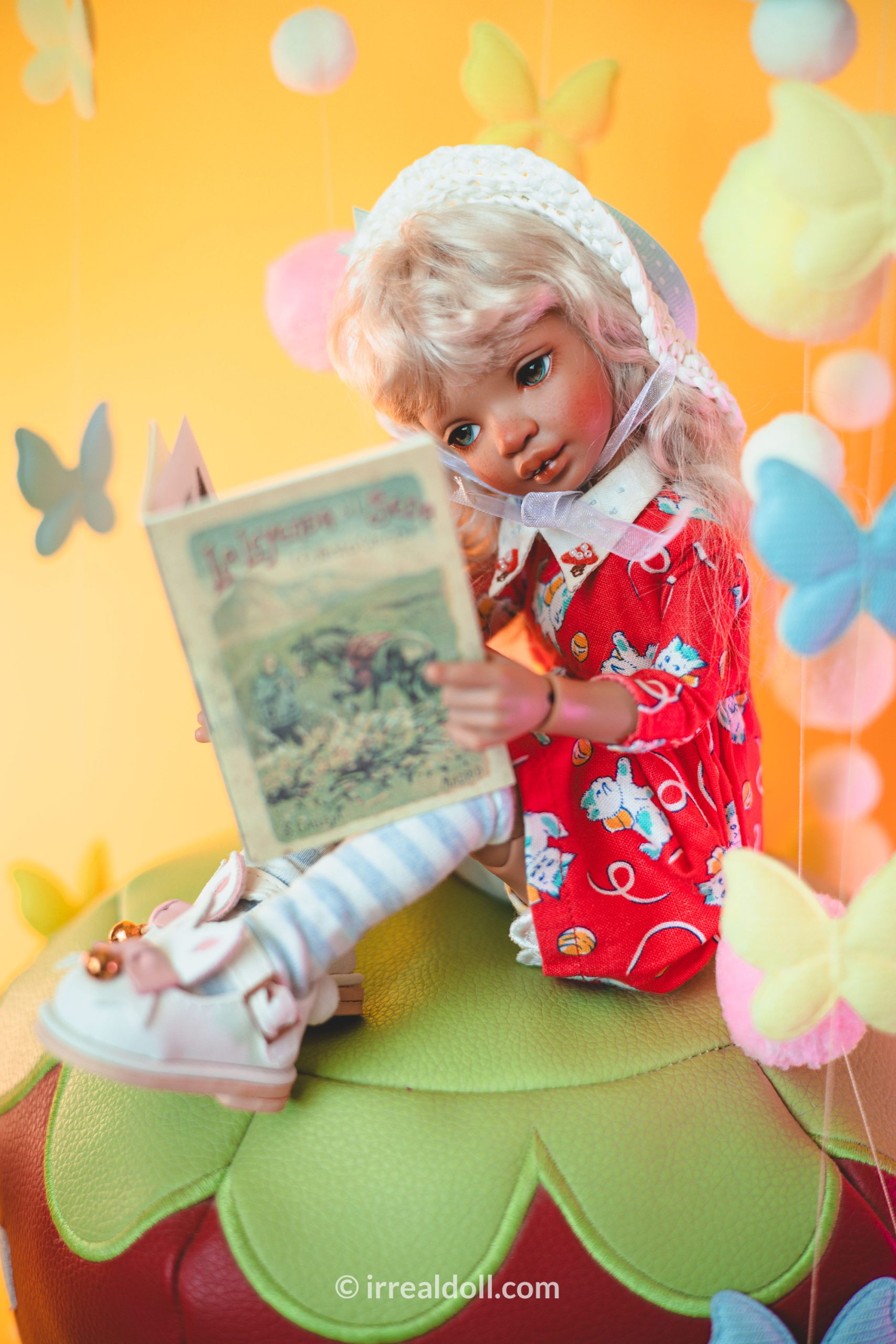 A picture of Surya, a 27cm tall doll from Irrealdoll in a dark skin tone.