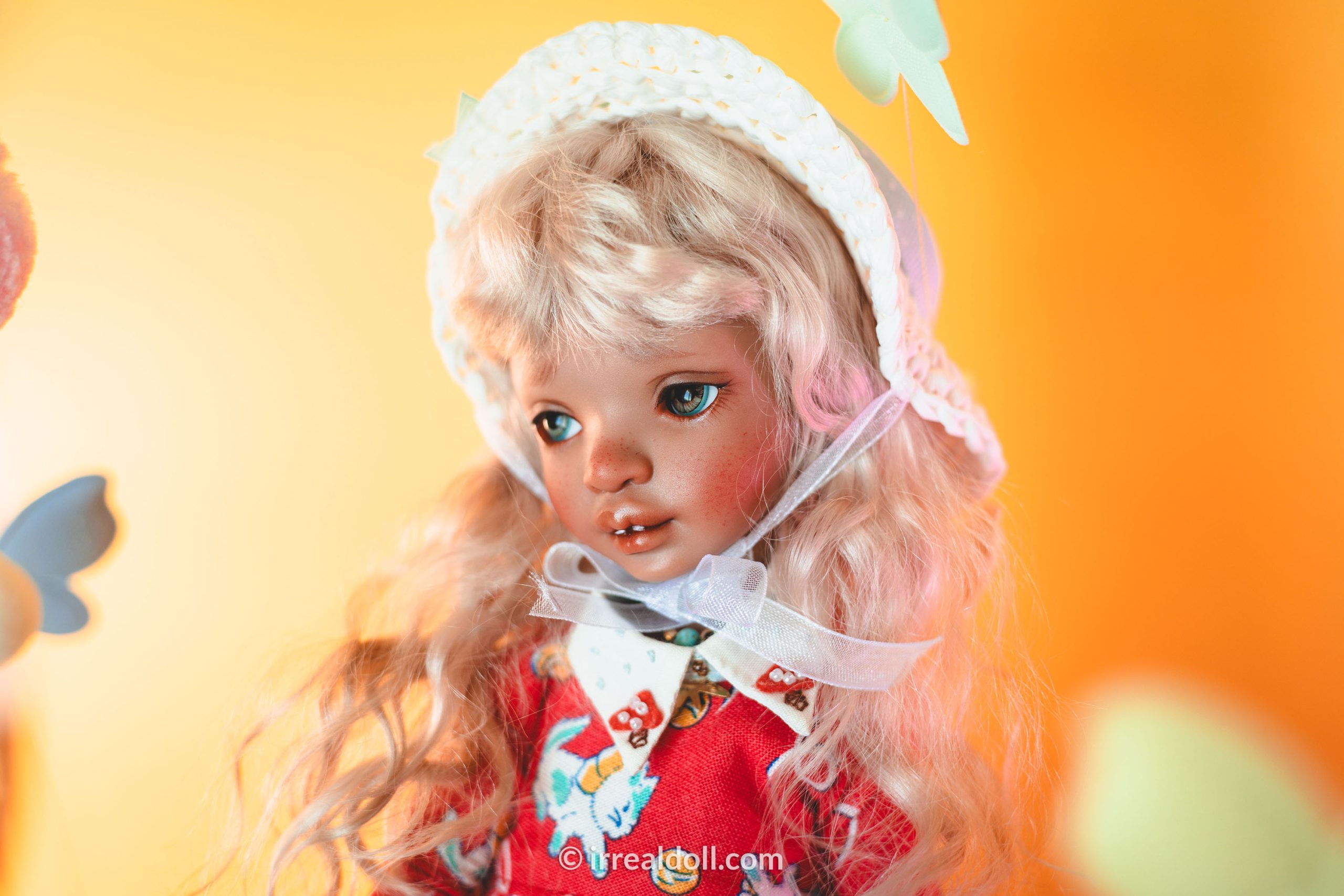 A picture of Surya, a 27cm tall doll from Irrealdoll in a dark skin tone.