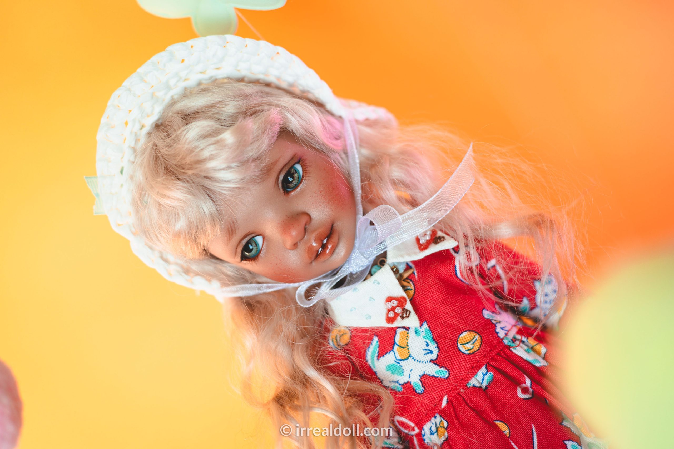 A picture of Surya, a 27cm tall doll from Irrealdoll in a dark skin tone.
