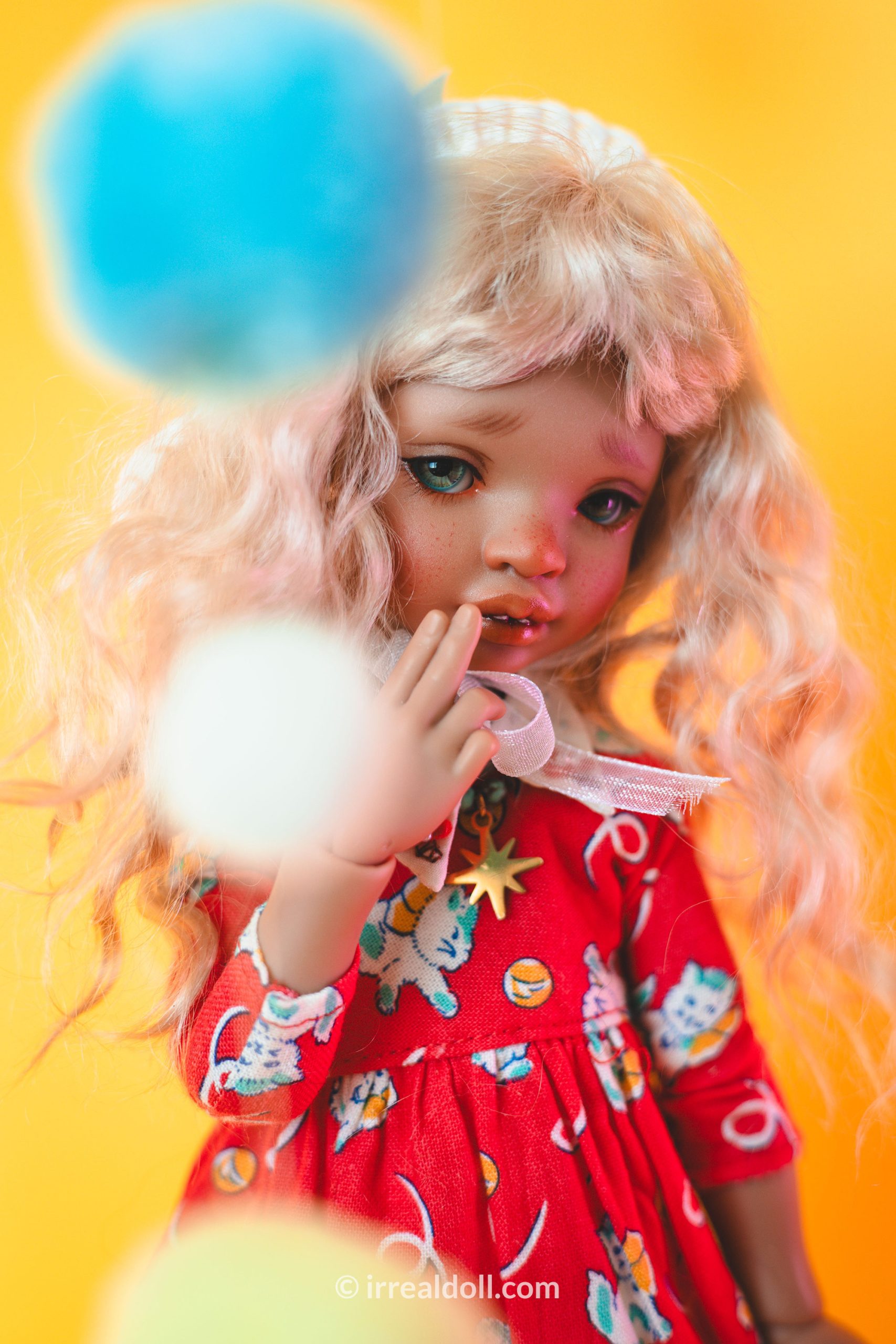 A picture of Surya, a 27cm tall doll from Irrealdoll in a dark skin tone.