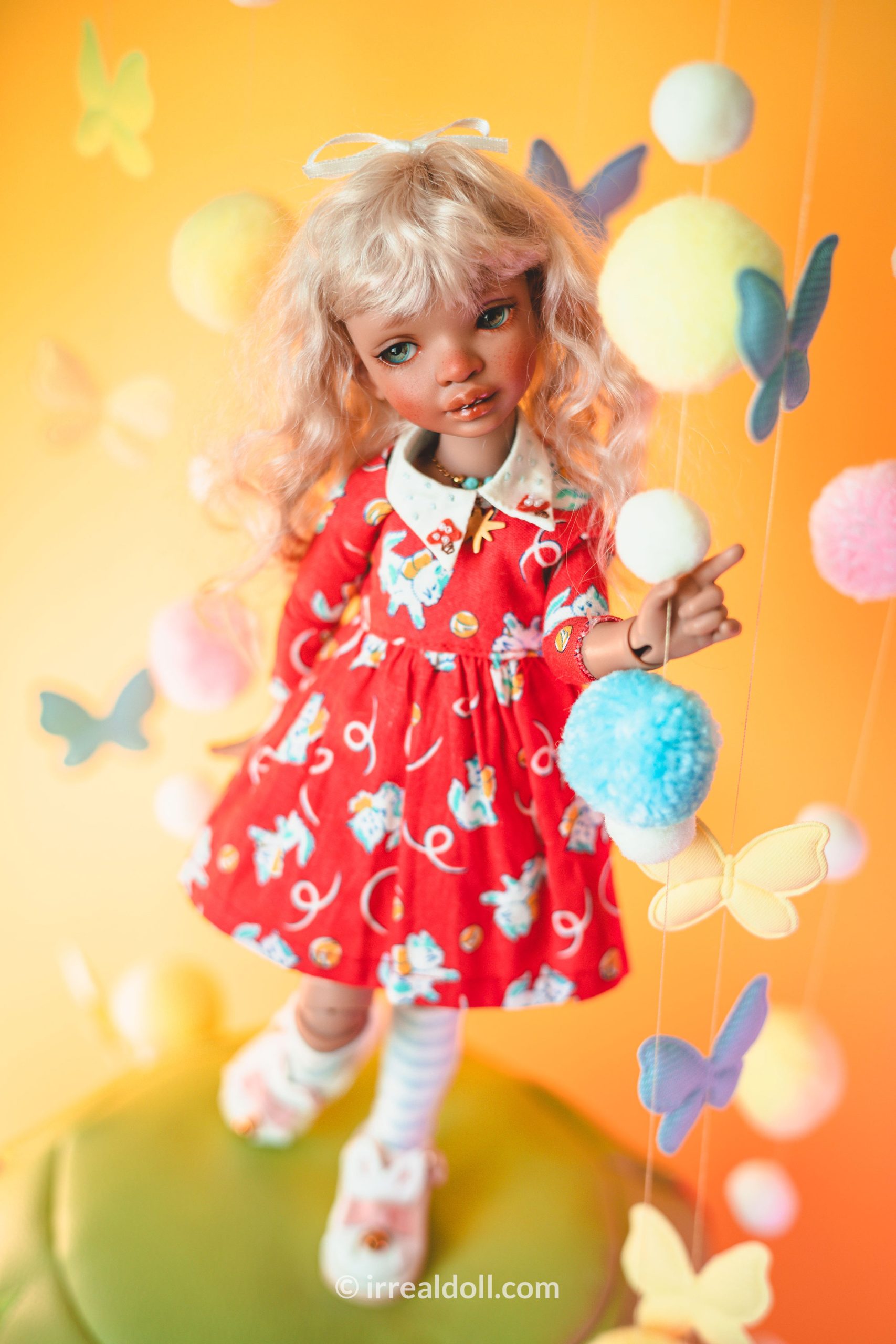 A picture of Surya, a 27cm tall doll from Irrealdoll in a dark skin tone.